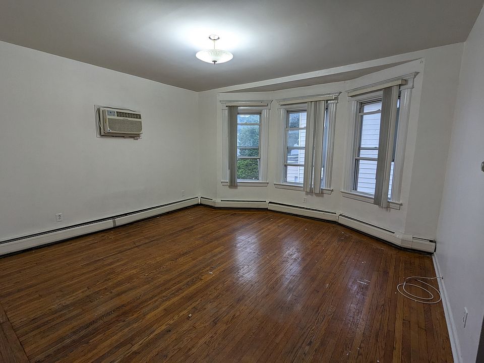 Main floor living room with built-in AC.