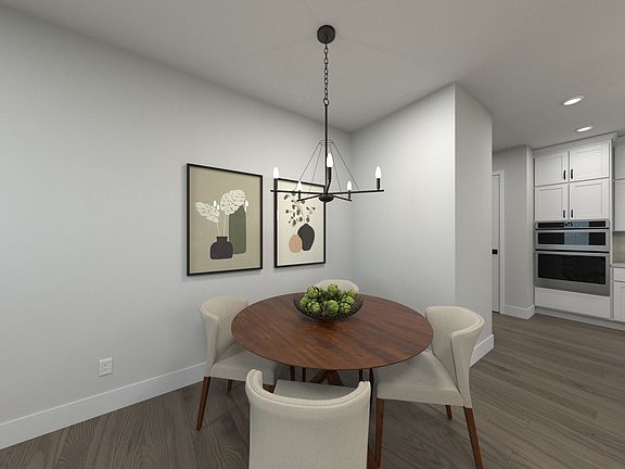 The open-concept floorplan allows for an easy flow between the kitchen and dining areas.