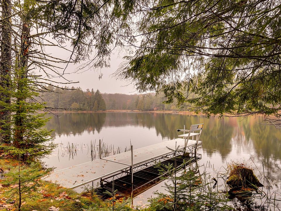 Your private dock and boat slip at Ian's Place Watersmeet Mi Vacation Rental