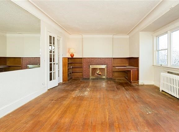 Another view of living room with firelplace