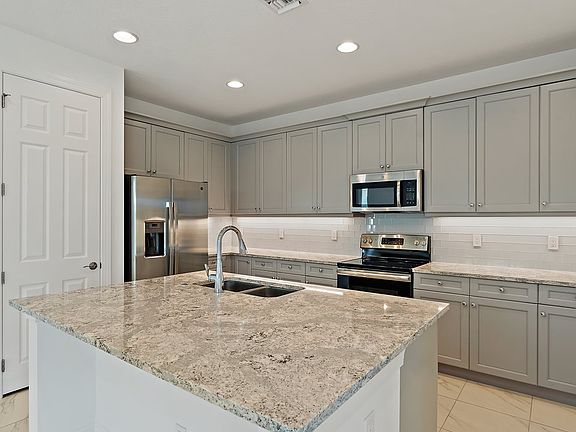 4th image of 24055 SW Firenze Way
