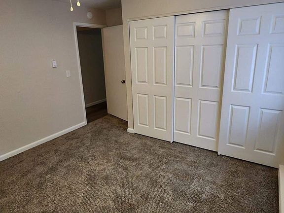 Ceiling fan & new carpet in bedrooms
