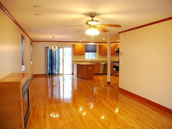 Living/dining with fireplace and hardwoods