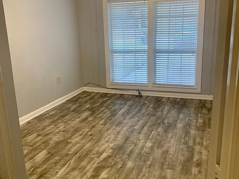 Bedroom #3 laminate flooring and closet new fan as of 2026