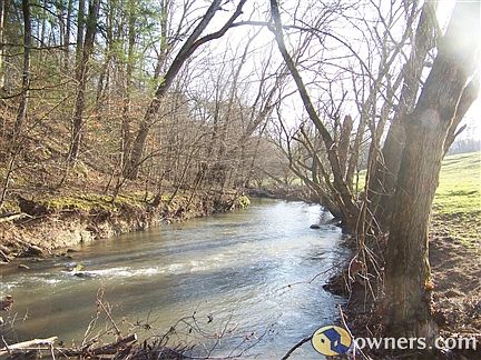 Creek borders half of property