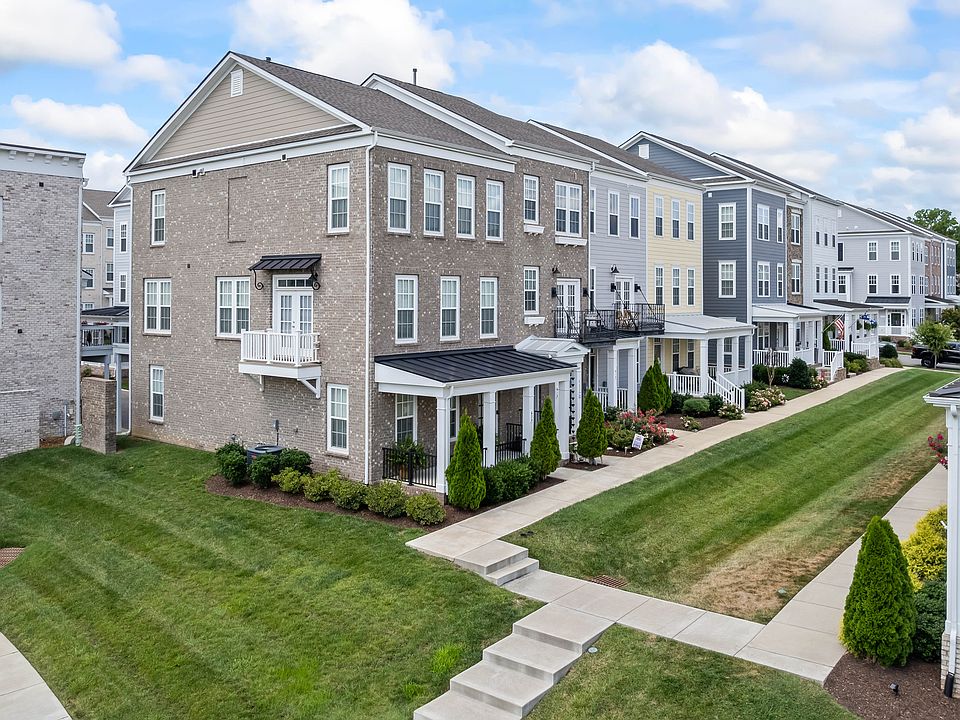 Desirable corner unit with three outdoor spaces.
