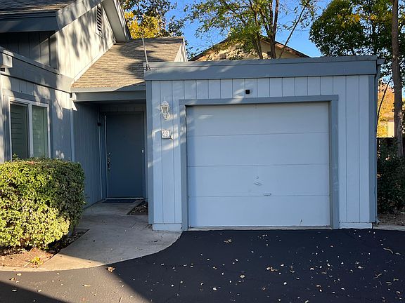 front door and garage looking east