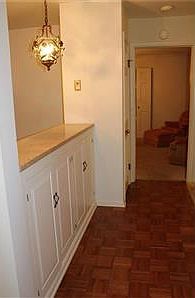 Parquet floored entry. Looking into Dining Room. Living Rm to left.