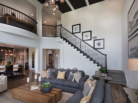 Great room with second staircase to game room