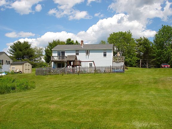 Large backyard on this 1 acre lot