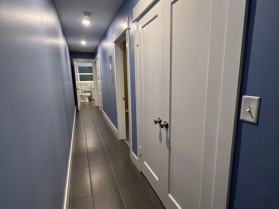 Hallway with closet for storage