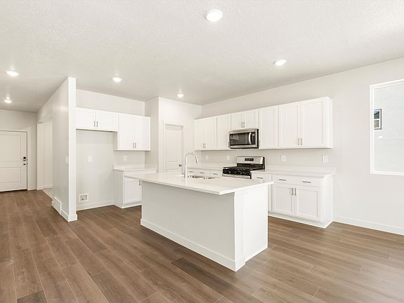 The Bryce floorplan interior image taken at a Meritage Homes Community in Tooele, UT.