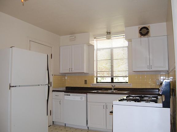 Huge kitchen with plenty space for breakfast table.