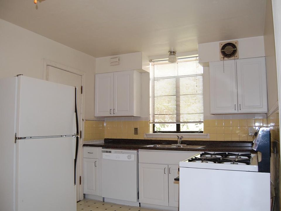 Huge kitchen with plenty space for breakfast table.