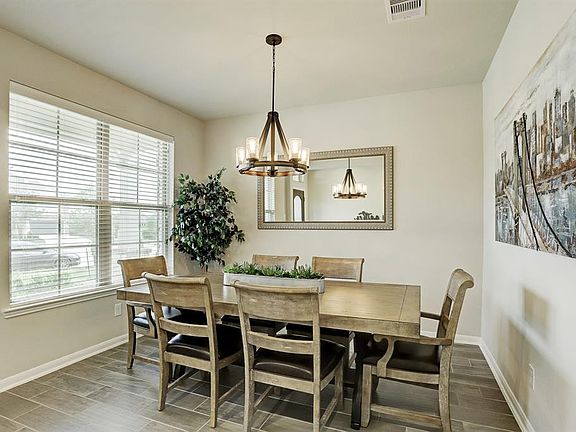 Dining room with ample seating for entertaining guests and family