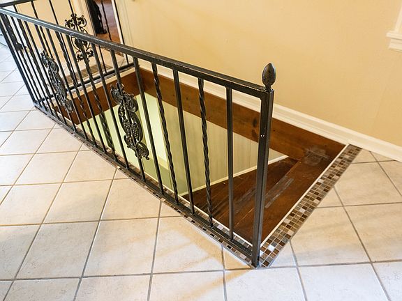 BASEMENT STAIRS W/TILE TRIM