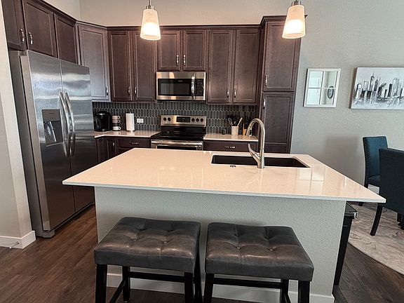 Kitchen area with counter seating