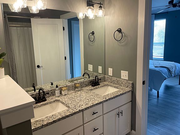 Master bathroom (not actual; photo of similar unit layout).