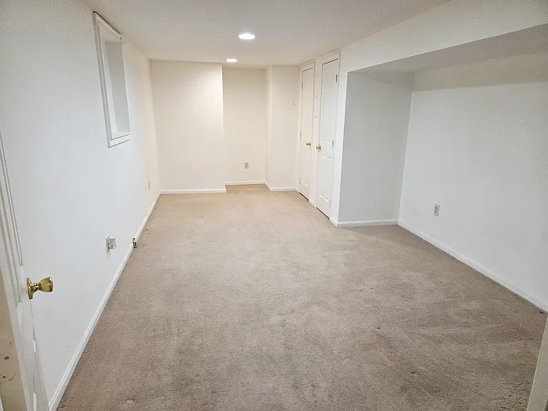 9409 Surratts Manor Dr #BASEMENT — Photo 10