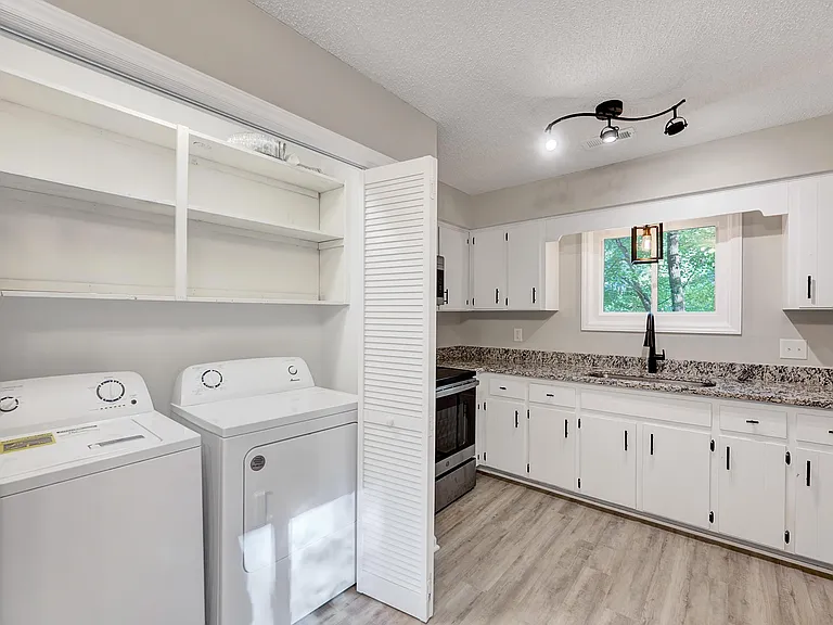 Washer and Dryer + Storage space next to the kitchen