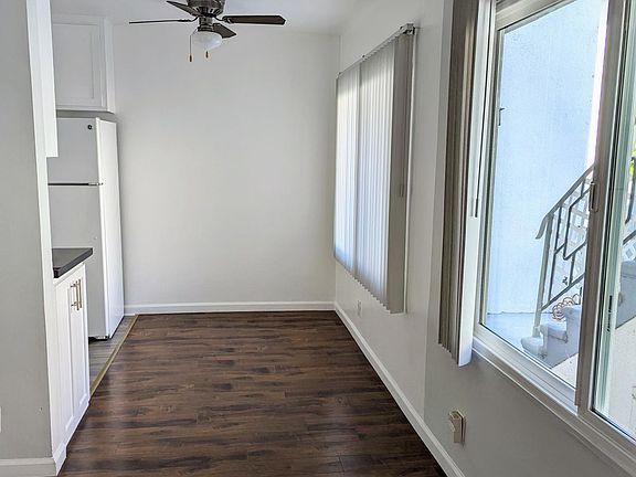 View from the living room looking towards the dining area and kitchen.
