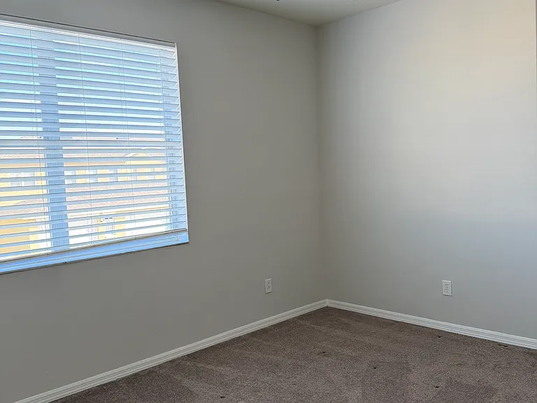 Upstairs bedroom 2. Carpet is a little over a year old.