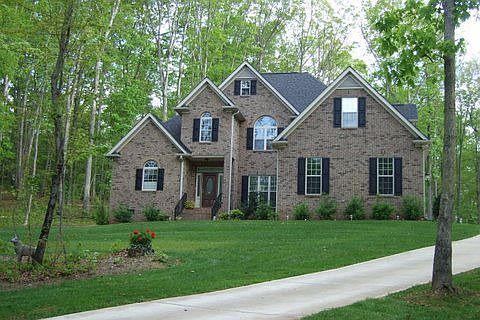 Gorgeous and set up high on a rare 2 acre lot!
