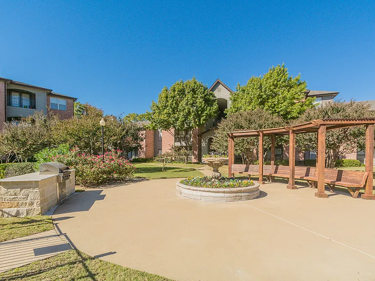 Outdoor BBQ Grill with Seating Area