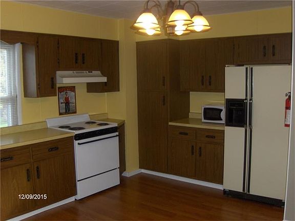 Large eat-in kitchen with loads of cabinet space.