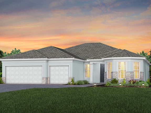 The Stellar, a one-story single family home with a 2.5 car garage, shown as home exterior FM2