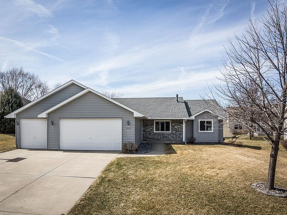 This rambler has a no-maintenance ext. of brick and metal siding and a newer roof w/ cement driveway.  Gutters new in 2016, all upper level windows and patio slider new in 2014.  Crisp white trim pops against the coordinating gray siding and brick.