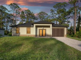 313 Mangonia Ave, Lehigh Acres, FL 33974
