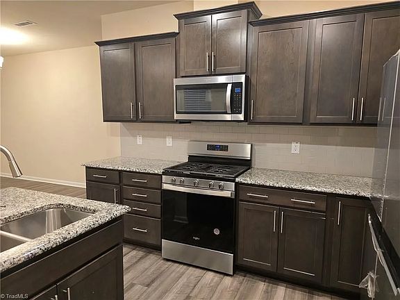5th image of 883 Falls Grove Trl #883