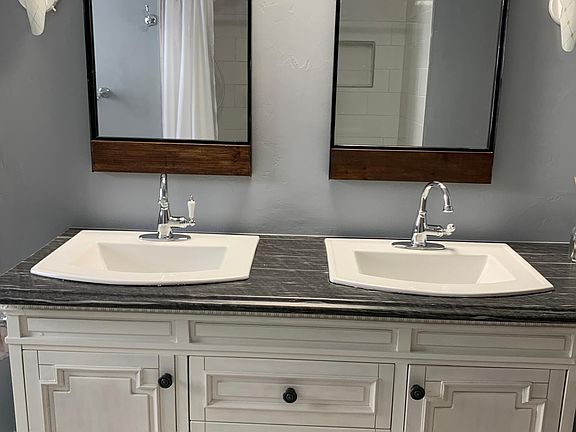 Bath with dual sinks