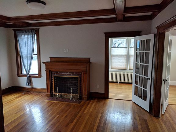 Living room with door into sunroom.