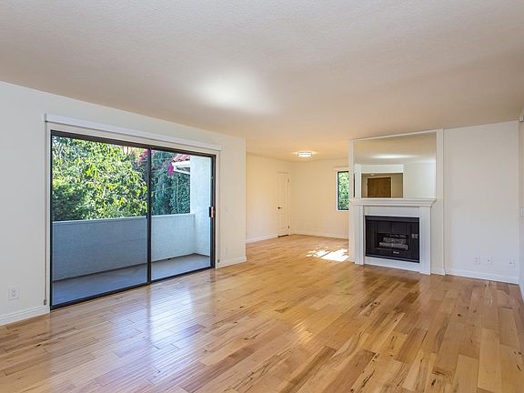 Gas Fireplace with Adjacent Patio Access