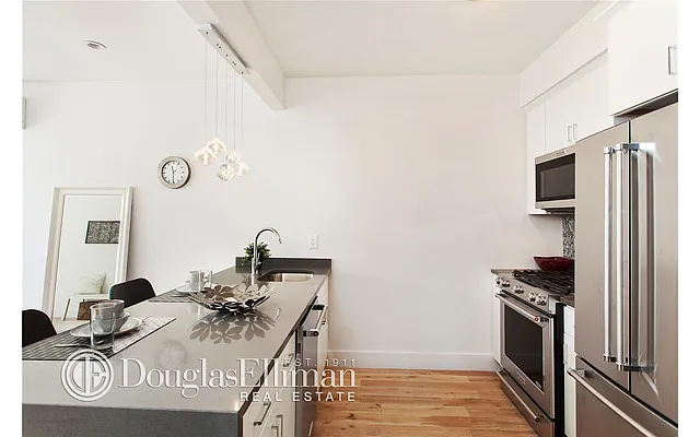 Sold by Douglas Elliman | media 6