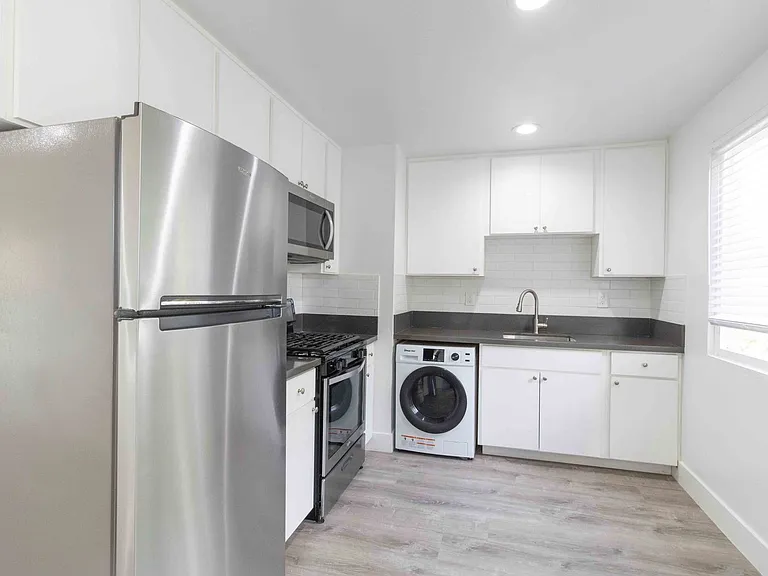 The Village Apartments — Photo 3