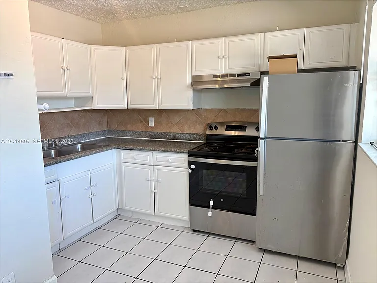 651 NW 42nd Ct #214 — Photo 10