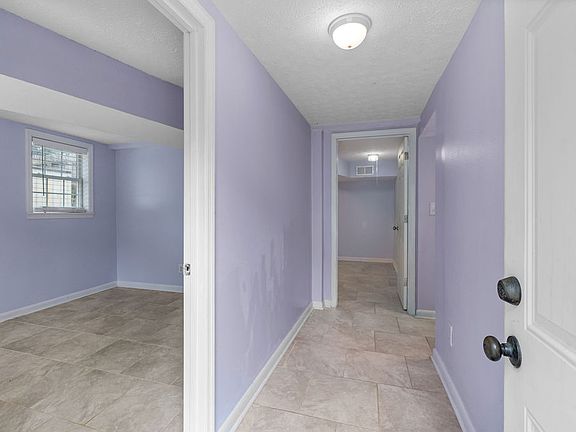 The entrance hallway. Room B2 is at the end of the hallway