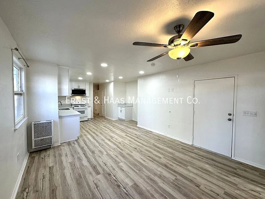 Renovated Apartment with a 1-Car Garage Included! — Photo 3