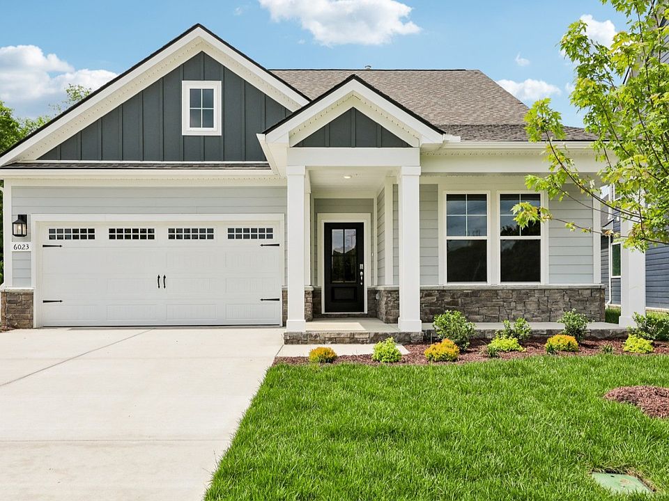 Front exterior with 2-car garage