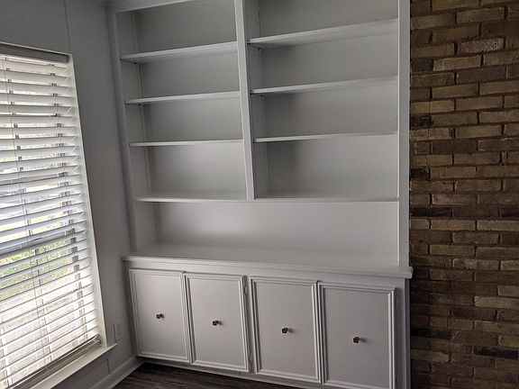 Living room area with bookshelves