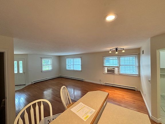 Open concept kitchen, dining area and family room