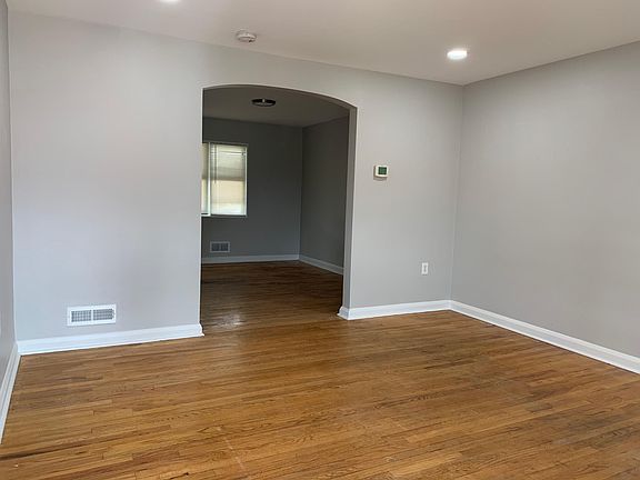 Front entrance, with living room leading into dining room.