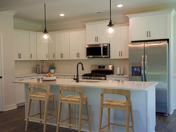 Photos represent a previous build, current selections may vary. Furnishings digitally enhanced.