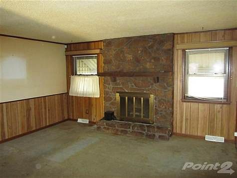 Living Room with wood burning fireplace