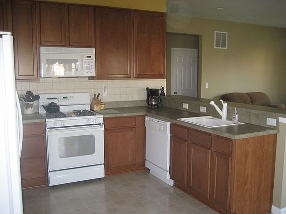 Spacious Kitchen With Maple Cabinets