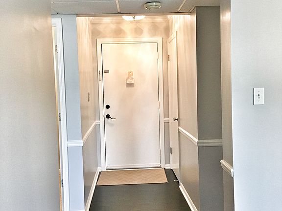 Foyer with a coat closet