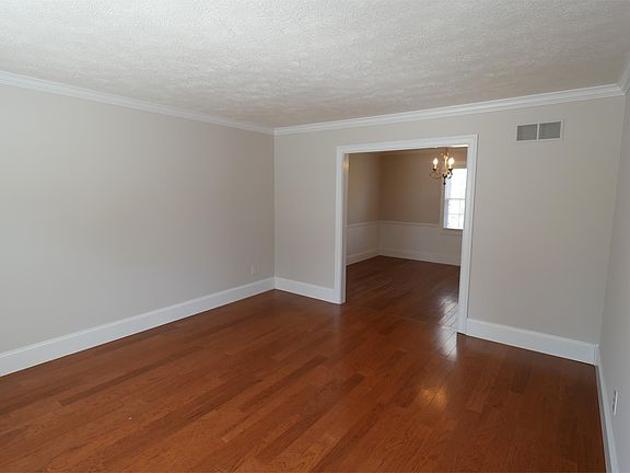 Living room off the front foyer and dining room. 13x15